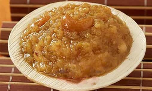 Sakara Pongal (Rice Cooked with Cane Sugar) Nivedhyam (Sacred Food Offering) to Sun God