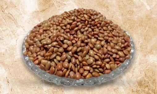 केतु मंदिर पर कोल्लू (चने की दाल) का दान